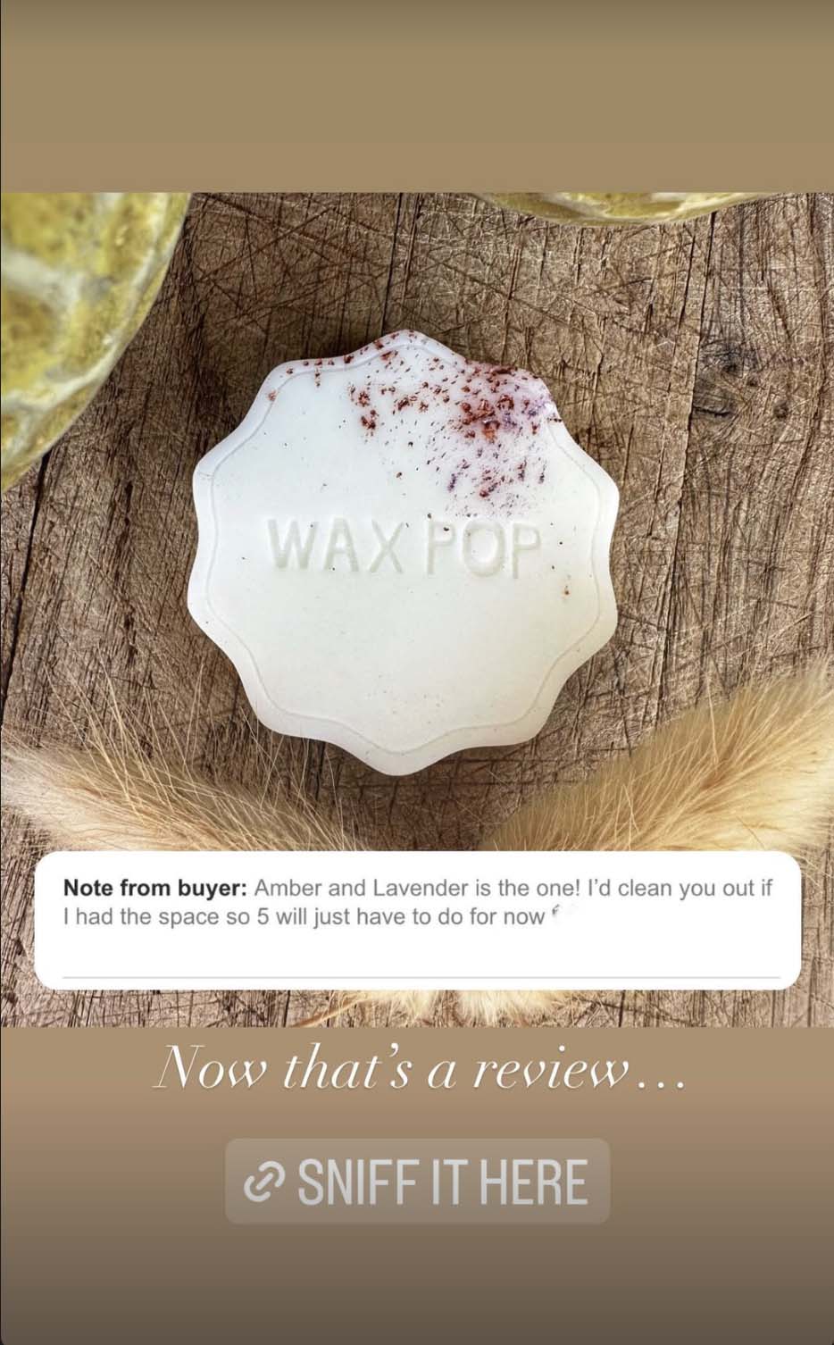 Wax pop on a wooden surface with a testimonial from a buyer and a call to 'Sniff It Here'.